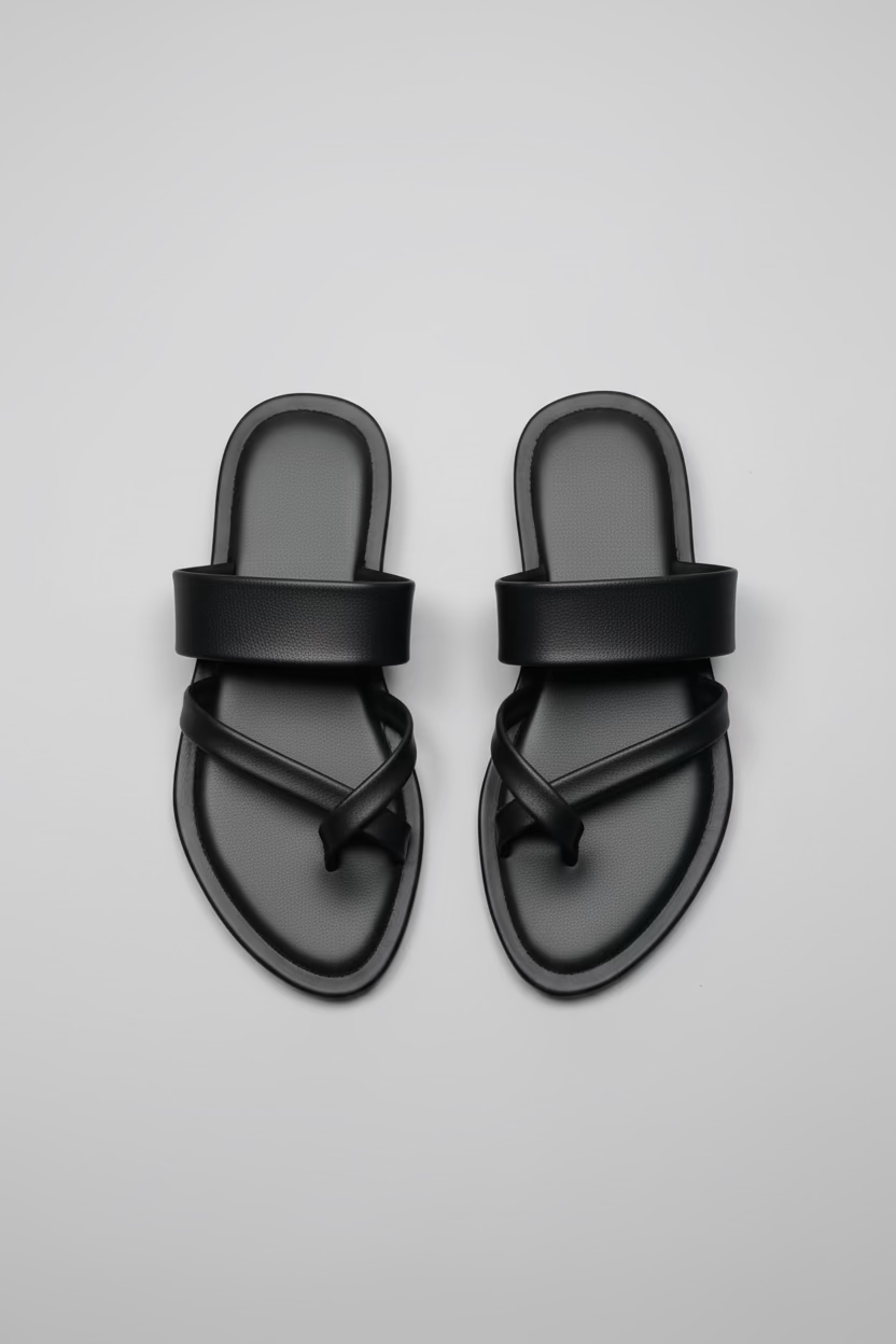 Kaal Angutha Kolhapuri chappal, handcrafted black leather sandal with signature toe-ring by NIIRA