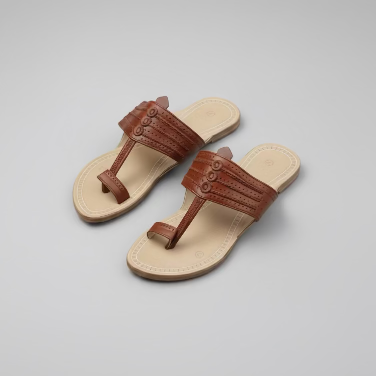 Pair of brown sandals with a beige sole on a light gray background